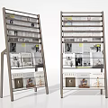 Modern Standing Bookshelves With Metal Frame And Multiple Shelves Displaying Magazines And Newspapers