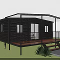 Modern Wooden House with Covered Porch Railing Wooden Deck Steps and Green Grass