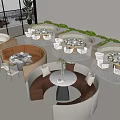 Various Colored Public Chairs Around Round Tables With Green Plants Large Windows Modern Open Space