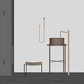 Modern Round Washbasin with Metal Stand and Woven Stool against White Wall in Minimalist Design