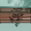 Outdoor Garden Bench With Wooden Slats And Metal Frame In Tree Shade