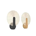 Modern Wall Lamps With Textured Glass Shades And Black Gold Finishes Emitting Warm Light