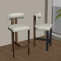 Two Modern Bar Stools With Upholstered Seats Wooden Legs By Window And Plant