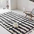 Elegant Lounge Chair With Wooden Frame Checkered Pattern On Black White Diamond Rug With Books
