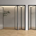 Modern Glass Folding Doors With Black Frames In Indoor Space Wooden Floor And Plant Decoration