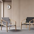 Two Stylish Leisure Chairs With Gray Black Fabric And Wooden Frame In Modern Minimalist Interior