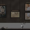 Abstract Paintings Hanging on Wooden Wall with Decorative Frames and Vase Accent