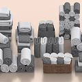 Neatly Arranged Gray And White Towels Stacked And Rolled In Basket
