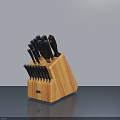 Stainless Steel Kitchen Knives With Black Handles In Wooden Block Stand