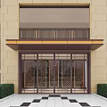 Building Facade Featuring Beige Stone Glass Door Canopy Geometric Pattern Green Shrubs And Red Flowers