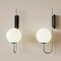 Modern Wall Lamps With White Globe Shades And Metal Frames On Beige Wall