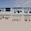 Organized Kitchen Cookware Hanging On Wall Racks With Pots Pans Spoons And Spatulas