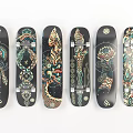 Stylish Black Skateboards With Colorful Decorative Patterns And Unique Artistic Designs