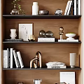 Modern Decorative Ornament Combination On Wooden Bookshelf With Books Sculptures And Vases