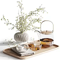 Glass Teapot and Small Teacups with Ceramic Vase and Flowering Branches on Wooden Tray