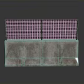Green Metal Grid Structure Mounted On Concrete Base For Outdoor Installation