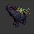 Green Leafy Plant in Blue Elephant Shaped Planter with Fresh Green Foliage