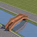 Wooden Garden Bridge With Stairs Railing Over Waterway And Grass Paved Path