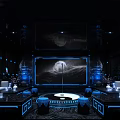 Modern Luxury KTV Interior With White Sofas Round Tables And Blue Lighting