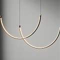 Modern Curved Pendant Lights With Illuminated Arched Design And Metallic Accents