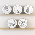 Wooden Shelves Displaying White Plates With Hedgehog Owl Squirrel Rabbit Bird Illustrations
