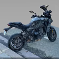 Black Sporty Motorcycle with Rearview Mirrors and Seat Parked on Roadside