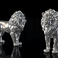 Two Polished Silver Lion Statues Standing On Reflective Black Surface