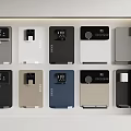 Various Colored Electronic Devices With Digital Displays In Display Case