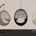 Rattan Hanging Chairs Brown Black White with Soft Cushions in Light Wall Wooden Floor Room
