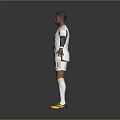 Football Player Wearing White Jersey With Fly Emirates Logo And Number 11 In Yellow Cleats