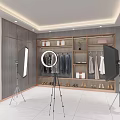 Contemporary Clothing Fitting Space Interior With Hanging Clothes Shoes Ring Light And Softboxes 3d model