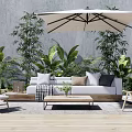 Modern Outdoor Sofa With Cushions Shade Umbrella And Green Plants In Patio