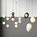 Multiple Modern Pendant Lights With Different Shapes Warm Illumination And Stylish Design