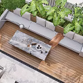 Modern Courtyard Garden Design With Wooden Deck Gray Sofa Fire Pit And Large Green Plants