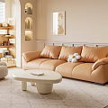 Beige Sofa and White Round Coffee Table Set with Orange Cushions in Warm Living Room