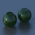 Pair Of Green Ceramic Vases With Wavy Textures On Blue Background