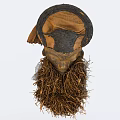 Handcrafted Tribal Mask Wall Decor With Brown Black Design Round Top And Fringed Beard