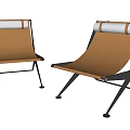 Modern Orange Lounge Chairs With Black Metal Frames And White Rolled Backrests