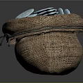 Blue Decorative Coins Filled in Brown Burlap Sack on Dark Background