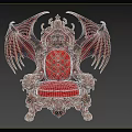 Luxurious Red Armchair With Ornate Bat Wings And Carved Lion Head Details