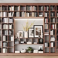 Elegant Wooden Bookcase with Multiple Compartments Books Framed Pictures Potted Plant and Decorative Items