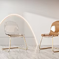 Modern Transparent Acrylic And Golden Dining Chairs With Metal Legs On Marble Floor