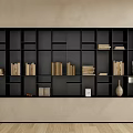 Modern Black Bookcase with Multiple Compartments Books Decorative Items Beige Wall and Wooden Floor