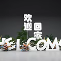 Floral Display With Welcome Letters Green Plants And Fresh Flowers For Homecoming