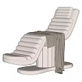 Modern Lounge Chair with Layered Cushions Light Beige and Cozy Gray Blanket on Circular Base
