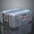 Gray Metal Toolbox with Multiple Latches Handles Orange Logo and Ventilation Holes on Reflective Surface