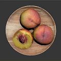 Fresh Peaches on a Wooden Plate One Halved with Juicy Red Flesh and Pit