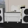 Modern Grey Home Stereo System With Speakers And Amplifier On Black Table