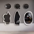 Different Shaped Mirrors Enhancing Gray White Wall In Contemporary Room Design