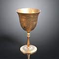 Golden Decorative Goblet With Intricate Carvings And Exquisite Base Design